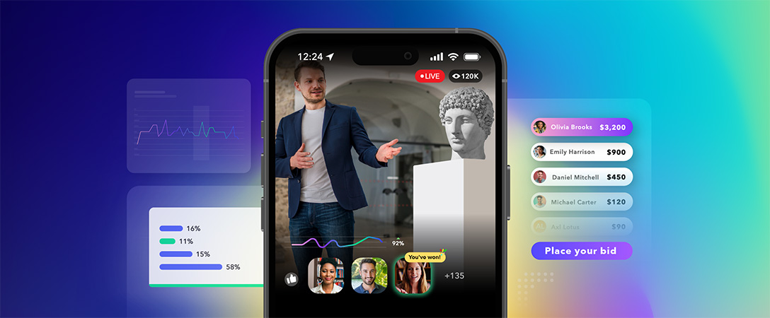Live auctioneer gesturing to a classical head bust sculpture with bids happening alongside mobile live stream